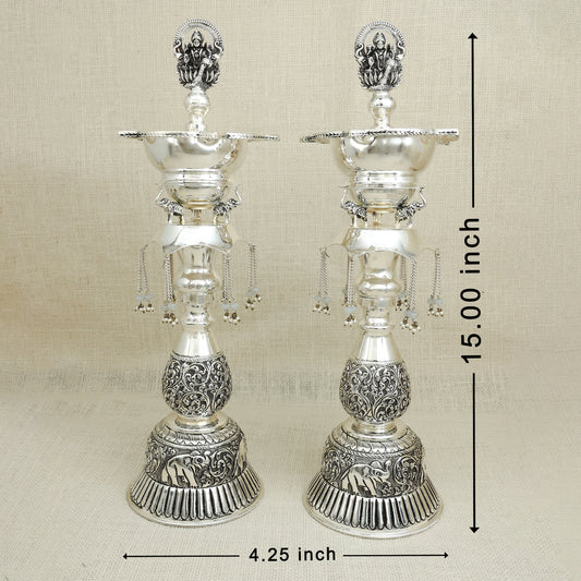 Handcrafted Silver Lakshmi Deepam Set – Ornate Standing Oil Lamps (Set of 2)