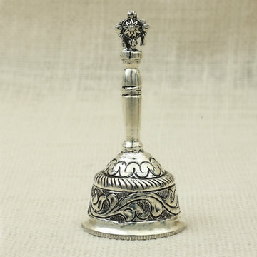 Antique Finish Silver Pooja Bell – Embossed Floral and Sun Motif Design