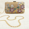 Exquisite Gold-Toned Clutch with Floral Embellishments