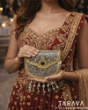 Emerald Tassel Heritage Silver Clutch