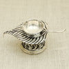 Silver Bilva Leaf Diya – Ornate Pooja Lamp with Traditional Motifs