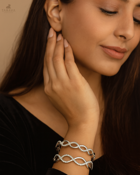 Elegant Twist Silver Bangles